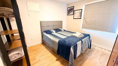 En eller flere senge i et værelse på ASA I Apartamento Central Park | Oktoberfest