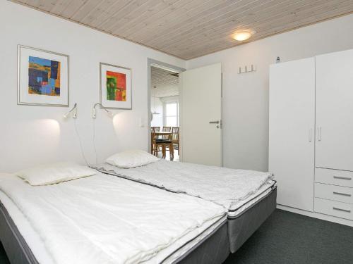 Ένα ή περισσότερα κρεβάτια σε δωμάτιο στο 10 person holiday home in Ranum
