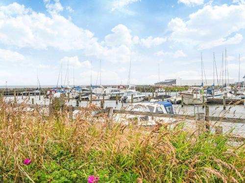 a bunch of boats docked in a marina at Holiday apartment near town square in Ringkøbing