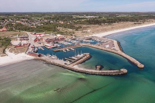 an aerial view of a marina on the beach at TV1652-Albaek-Musvagevej-116 in Ålbæk