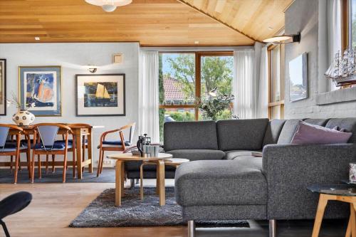 a living room with a couch and a table at TV1656-Skagen-Vandvaerksvej-16 in Skagen