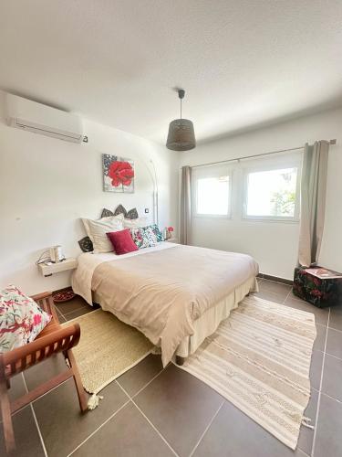 Llit o llits en una habitació de Wave Coconut Villa