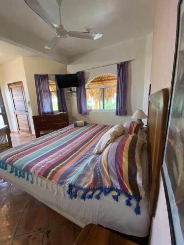 Cama o camas de una habitación en Cielito Lindo Suites