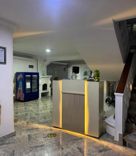 a room with a kitchen and a living room at Hotel Dream Luxury in Bogotá