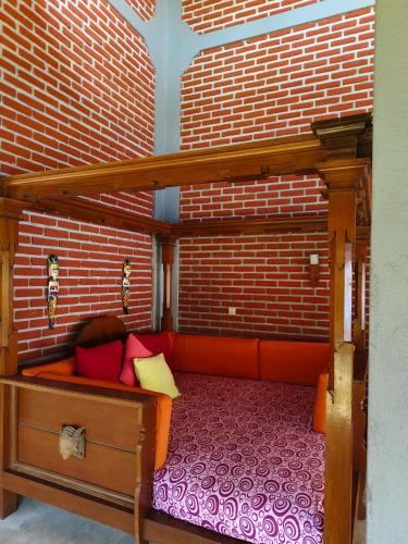 Postel nebo postele na pokoji v ubytování Teluk Indah Beach & Pool Villa