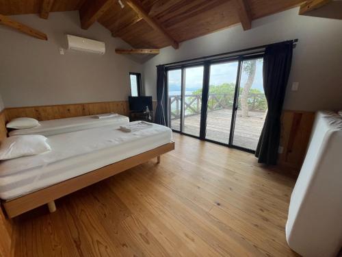 Ένα ή περισσότερα κρεβάτια σε δωμάτιο στο LaVilla - Vacation STAY 27367v