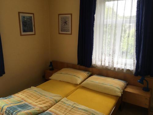Postel nebo postele na pokoji v ubytování U Evy Jarošové