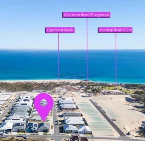 arial view of a parking lot with a pink marker at Sandcastle by the Sea in Yanchep