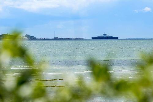 a large ship in the ocean with at 20311-Samso-Havvejen-87 in Sælvig