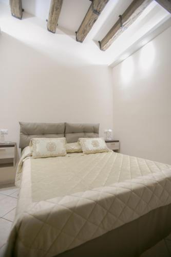 Postel nebo postele na pokoji v ubytování Hotel la Fenice
