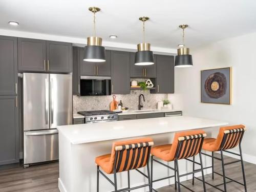 a kitchen with a white counter and a refrigerator at Luxury Resort Style 2Bedroom 2Bath Desert Oasis Desert Ridge in Phoenix