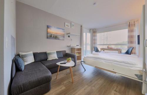 Ένα ή περισσότερα κρεβάτια σε δωμάτιο στο Frische Brise - 108