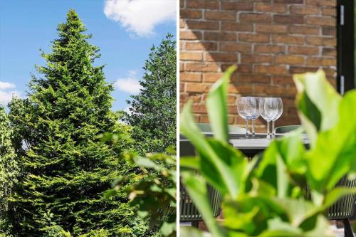 a christmas tree and wine glasses on a table at SB101-Tinglev-Sofiedalvej-42 in Tinglev