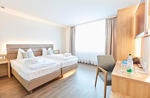 Vital Hotel an der Therme GmbH tesisinde bir oda