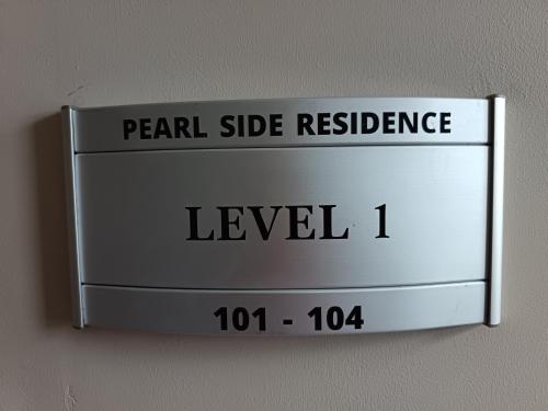 a sign that reads pearl side residence level at Apartment in Flic en Flac - Pearl Side Residence 101 in Flic-en-Flac