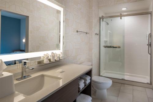 a bathroom with a sink and a toilet and a shower at Home2 Suites By Hilton West Lafayette in West Lafayette