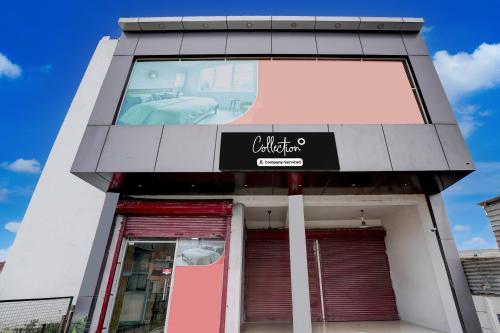 a building with a sign on the front of it at Collection O Palwal-Aligarh Crossway Formerly Hotel Kadamb in Palwal