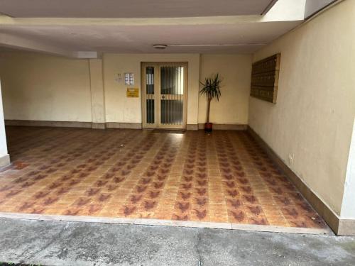 an empty empty room with a hallway with a door at Manuel House in Pisa in Pisa
