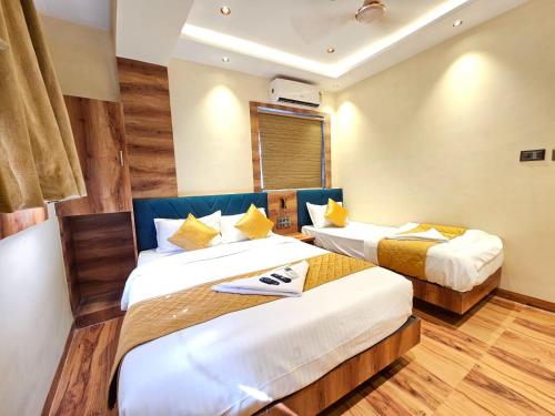 Voodi või voodid majutusasutuse Hotel Imperial Suite toas