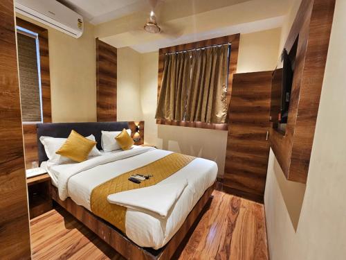 Voodi või voodid majutusasutuse Hotel Imperial Suite toas