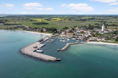 an aerial view of a harbor with boats in the water at 20331-Samso-Vestergade-37 in Kolby
