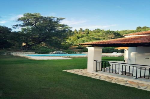 Bazén v ubytování Villa in Corfu near Porto Timoni Beach nebo v jeho okolí