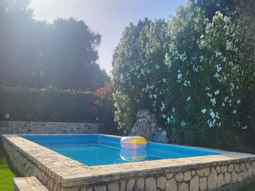 Bazén v ubytování Villa in Corfu near Porto Timoni Beach nebo v jeho okolí