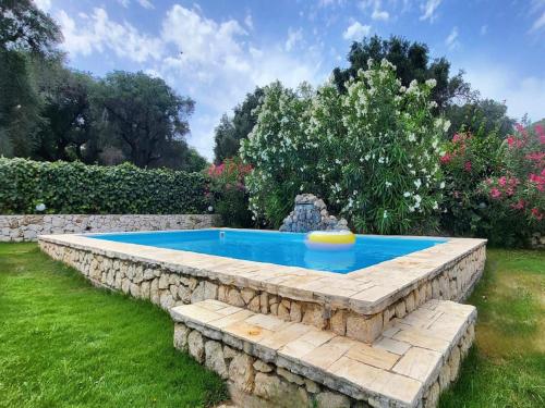 Bazén v ubytování Villa in Corfu near Porto Timoni Beach nebo v jeho okolí