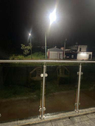 a view of a street at night with a street light at Casa Tequila Club in Arandas