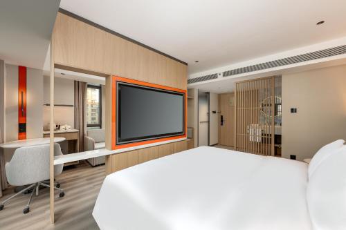 Postel nebo postele na pokoji v ubytování Holiday Inn Express Guiyang Downtown by IHG