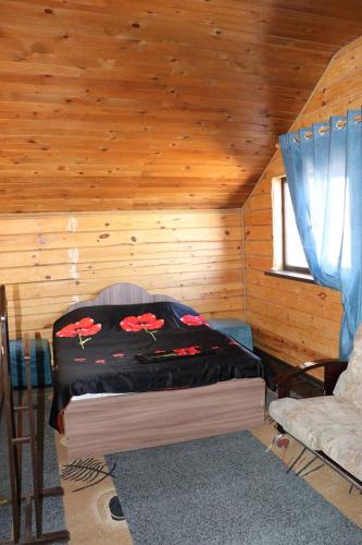 Ένα ή περισσότερα κρεβάτια σε δωμάτιο στο Eco House Chynar