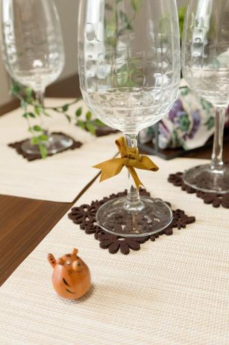a table with wine glasses and a pumpkin on it at SN4B ノワールネスト 都会のシックな隠れ家 名古屋市中区 Noir Nest urban chic retreat Nagoya City in Nagoya