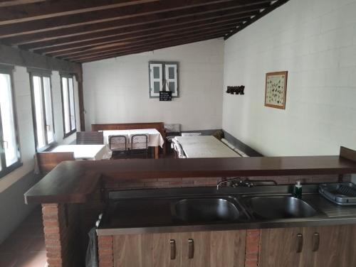 Η κουζίνα ή μικρή κουζίνα στο Albergue Turístico Briz