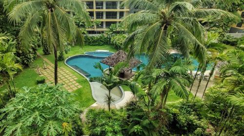 Κήπος έξω από το Casuarina Shores Apartment - SHA Plus