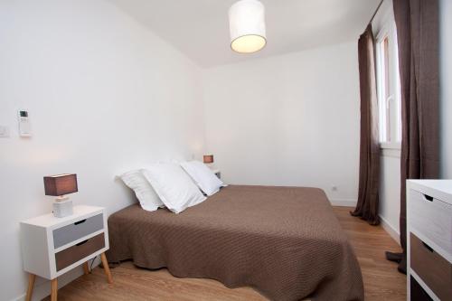 Postel nebo postele na pokoji v ubytování Appartement plage du Trottel