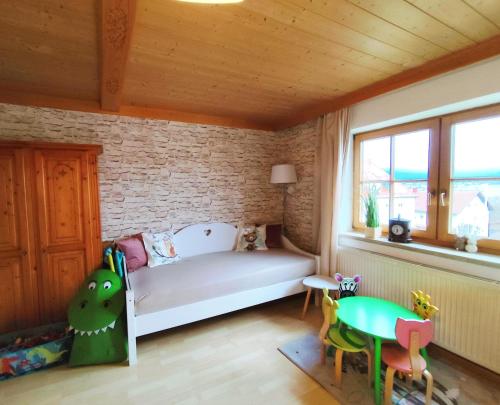 Postel nebo postele na pokoji v ubytování Ferienwohnung zur alten Schmiede