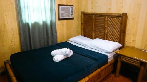 Postel nebo postele na pokoji v ubytování Dawal Beach Resort