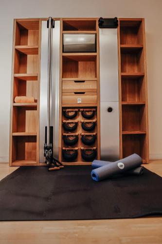 a rug on the floor in front of a refrigerator at Hotel Villa Medici in Bad Schonborn