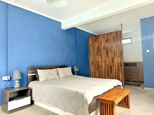 Katil atau katil-katil dalam bilik di Relaxed Coastal Living