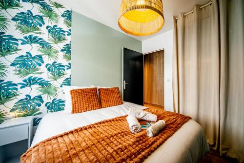 Ένα ή περισσότερα κρεβάτια σε δωμάτιο στο L'Industriel - Proche Hôpital - Parking - Balcon