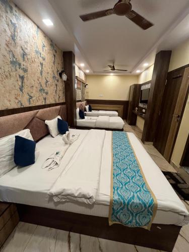 Postel nebo postele na pokoji v ubytování KS PAYING GUEST HOUSE