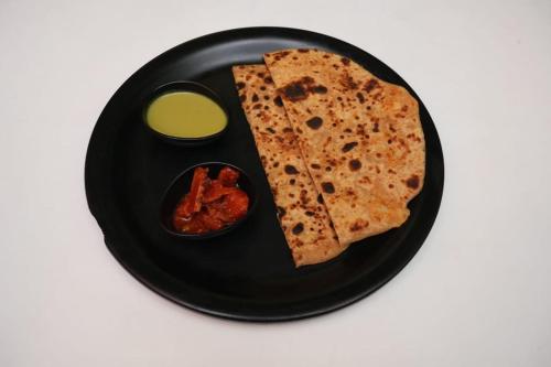 ゲストハウスの敷地内または近くでの食事または食べ物