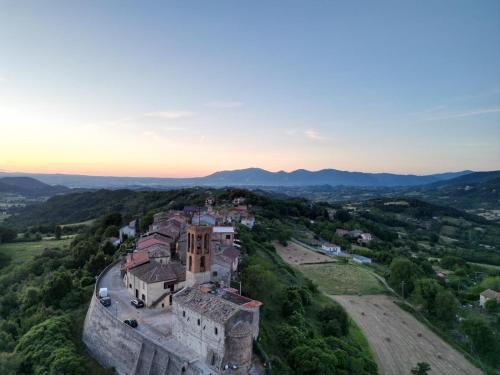an aerial view of an old building on a hill at B&B Rox e Claudia in Lugnola