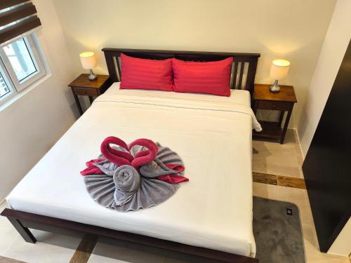 Ένα ή περισσότερα κρεβάτια σε δωμάτιο στο Blue Haven Bay Villa 21C
