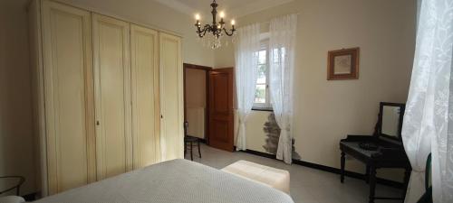 Postel nebo postele na pokoji v ubytování Casa Margherita