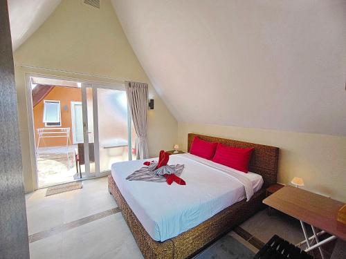 Ένα ή περισσότερα κρεβάτια σε δωμάτιο στο Blue Haven Bay Villa 21C