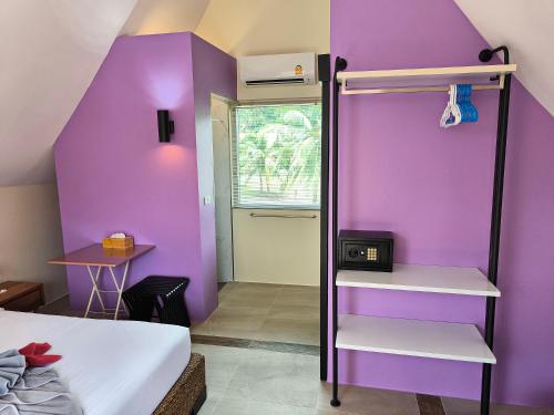 Ένα ή περισσότερα κρεβάτια σε δωμάτιο στο Blue Haven Bay Villa 21C