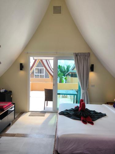 Ένα ή περισσότερα κρεβάτια σε δωμάτιο στο Blue Haven Bay Villa 21C