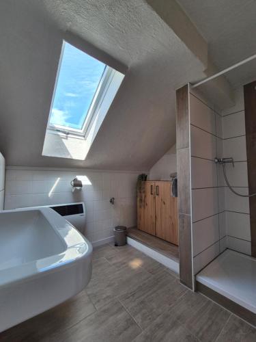 a bathroom with a large sink and a window at Silva2 in Kappel-Grafenhausen