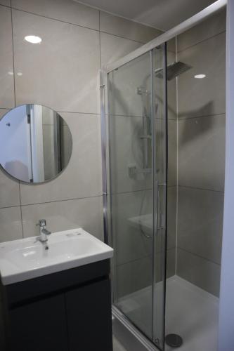 Koupelna v ubytování Harrow Hotel